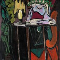 Pablo Picasso Reading At A Table - 1934
